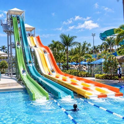 calidad Deslizamiento acuático Rainbow Racer Multi Lane Fibra de vidrio deslizamiento para parque acuático Fábrica